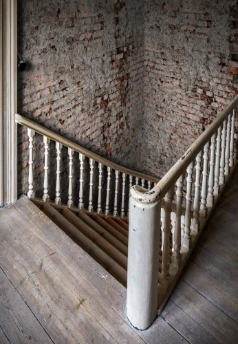 Fototapeta cegła Rebel Walls R17871 Barcelona Rust Scenery