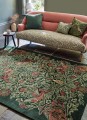 Dywan z botanicznym wzorem zielony MOREW – BIRD TRUMP GREEN 128307 Morris & Co.