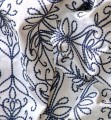 Tkanina haftowany ornament Harlequin 134068 Java Linen Idyllic