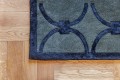 Dywan z geometrycznym wzorem Carpets & More X Magda Fornal 5038 GLAM DARK GREEN BLACK Classics