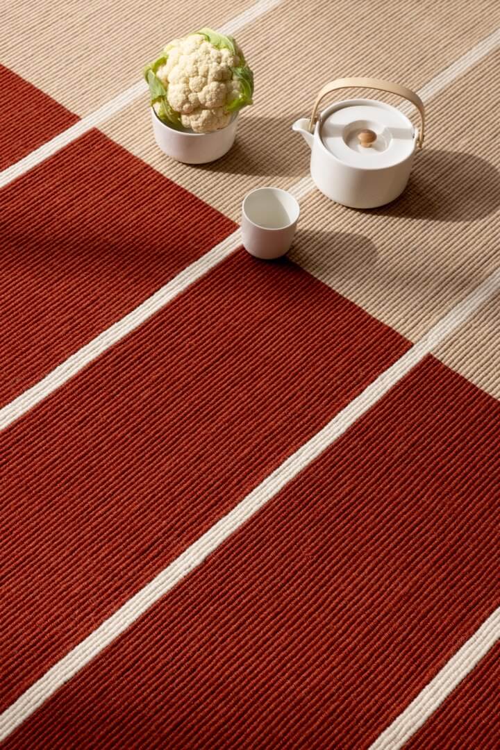 Dywan wełniany w paski Marimekko Tiibet Burnt Orange 132803