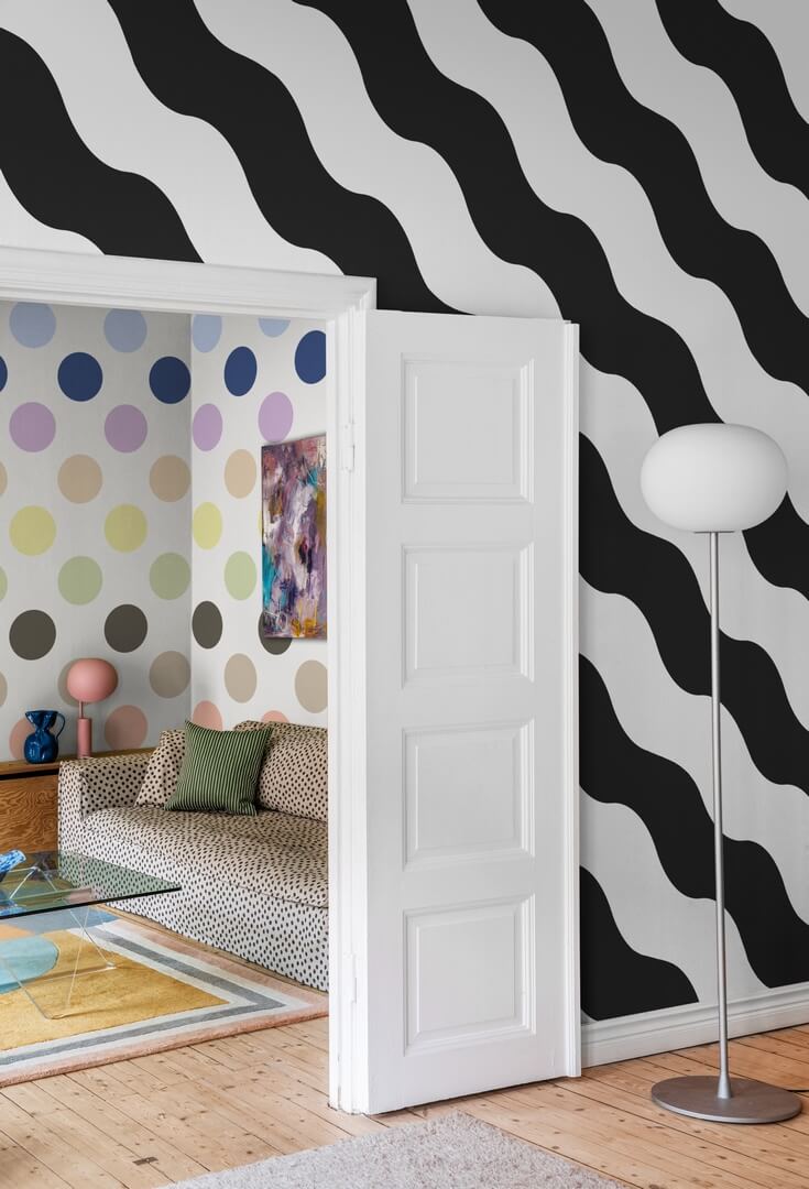 Fototapeta falujące paski Rebel Walls R20042 Polka Stripe Black White Happy Socks